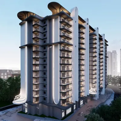 This apartment complex in Mangalore features a refined and well-balanced facade. Clean, modern arches and vertical fins create a play of light and shadow, giving the building a sophisticated and timeless look that reflects the city's architectural essence.