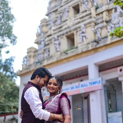 A romantic couple portrait taken at the iconic Bull Temple in Basavanagudi, Bangalore. This location adds a traditional and architectural element to pre-wedding photography.