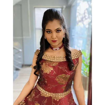 This is a gorgeous Sangeet look, perfect for a night of dancing. I created a dramatic eye with a sharp wing and paired it with a bold red lip for a glamorous finish.