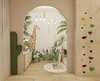 We designed this children's crèche to be a space where imaginations can soar. It features a playful jungle mural, a small rock-climbing wall, and other elements that encourage active and creative play in a safe environment.