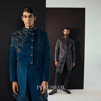 My Winter 23-24 collection is about sophistication in pure fabrics. Here, a teal velvet bandhgala with asymmetrical embroidery stands beside a grey version, both exuding a quiet, regal power.