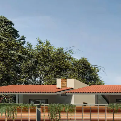 A render of the street elevation for the Benchmark Aradhya development. The design uses repeating elements like slatted wooden screens and terracotta tile roofs to create a harmonious and rhythmic streetscape that still allows for individual expression.