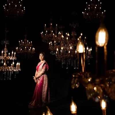 A bride surrounded by a galaxy of chandeliers. I wanted to create a portrait that was as magical and radiant as she is, using the lights to frame her in a sea of gold.