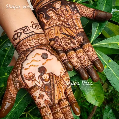 This is a popular Karwa Chauth design, telling the story of the festival across both hands with detailed figurative work.