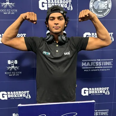This is me, Kapil, at a professional boxing event. As an active fighter, I bring the latest techniques and a real fighter's mindset to my coaching, ensuring you get the most effective training possible.