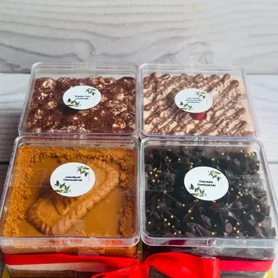 My assorted dessert tub gift box is the perfect gift for any occasion. This set includes four of my most popular flavors: Lotus Biscoff Cheesecake, Tiramisu Tres Leches, Chocolate Overload, and Choco Nutella Mousse with Strawberries.