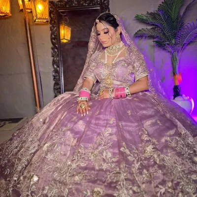 This voluminous lavender lehenga with silver floral embroidery is a dreamy and romantic choice for a modern bride.