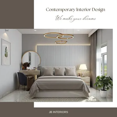 Contemporary interior design is about creating a comfortable and welcoming space with clean lines and a neutral color palette. This bedroom showcases a fluted accent wall, modern circular lighting, and a simple, elegant aesthetic.