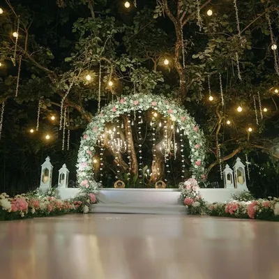 A fairytale setting for a magical night. We capture the beauty of your wedding decor, like this enchanting floral arch at Royalton Leisure, to preserve the ambiance of your celebration.