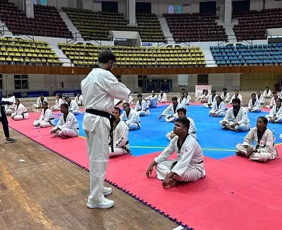 Addressing a large group of participants at the start of a National Kyorugi Referee Seminar in Cuttack, Odisha. My goal is to impart knowledge and instill a deep respect for the rules of Taekwondo.