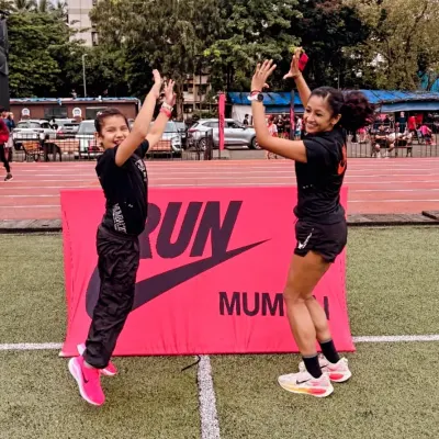 High-fiving my daughter at a Nike Run event. Every time a mom pursues her passion, her child learns the power of possibility. Homes thrive when moms are strong.