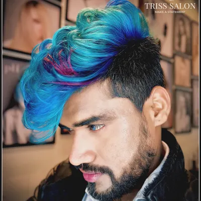 Unleashing the vibrant world of Crazy Colors by Keune. This look features a bold mix of blue and pink on a sharp undercut, perfect for anyone who dares to stand out and let their hair do the talking.