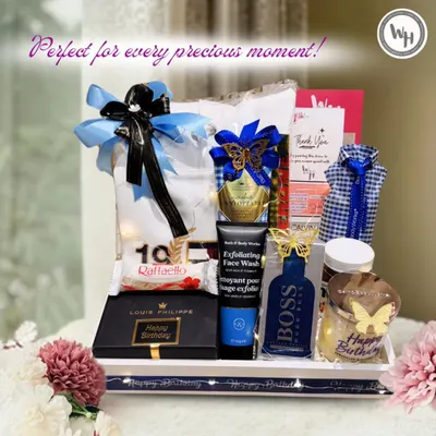 This is the perfect gift for every precious moment. My exclusive men's hamper includes a Tommy Hilfiger T-shirt, Hugo Boss perfume, and other luxury essentials.