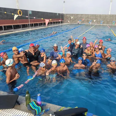 This picture says it all. It’s not just about teaching swimming skills; it’s about the pure joy on the faces of both the kids and the coaches. This is why I do what I do.