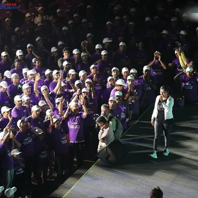 Interacting directly with the crowd from the stage at the Safe-A-Thon. My approach to hosting is all about real engagement, not just talking at people.