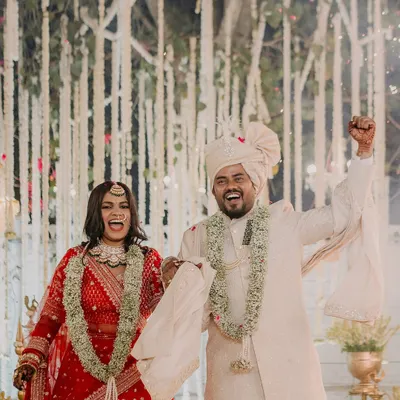 A moment of pure celebration after the ceremony. I love capturing the unscripted joy and energy of a couple as they begin their new life together.
