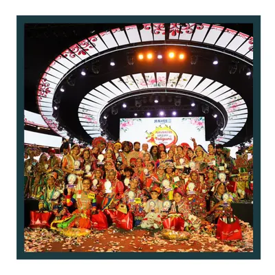 A fantastic group photo with all the winners at the Falguni Pathak Garba Fest. Each winner is holding a hamper I designed specifically for the event, showcasing my ability to cater to large groups.
