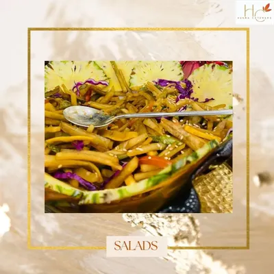 We believe salads can be both healthy and a work of art. This colorful salad is artfully presented in a carved pineapple bowl, making it as beautiful as it is delicious.
