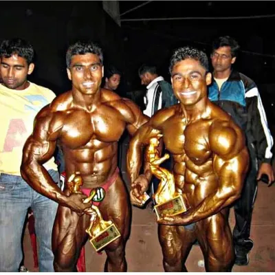 This photo is a throwback to the Satish Sugar Classic bodybuilding competition in 2010. That's me on the right, holding the trophy. This is a reminder of the long journey and the many stages I've competed on.