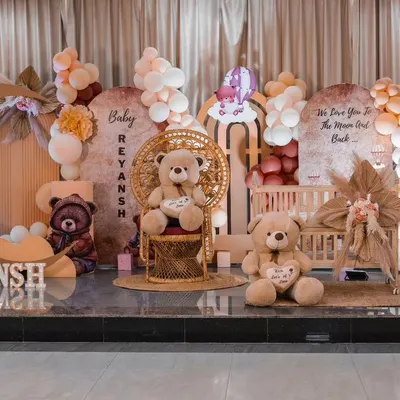 A "We Love You to the Moon and Back" teddy bear theme for a baby's rice ceremony. I can adapt this popular and heartwarming theme for various traditional functions, blending modern aesthetics with cultural celebrations.
