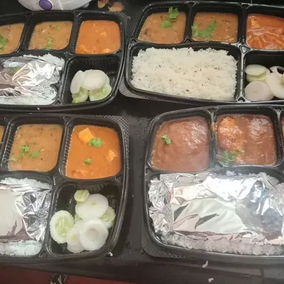 Our North Indian vegetarian thali is a complete meal solution for your events. It features multiple dishes including dal, a seasonal vegetable or paneer curry, fresh rice, and rotis, offering a wholesome and traditional dining experience.