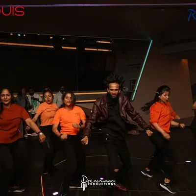 Our team performing on stage at the Radisson Blu for the RDI Party Celebration. We bring our energy to corporate events and parties.