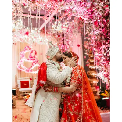 The moment the world fades away. I live for these explosions of joy, like this varmala ceremony, where a shower of flowers marks the beginning of a lifetime of laughter and love. It's pure, unscripted magic.