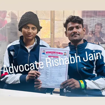 A happy couple proudly displays their official marriage certificate. My team ensures the court marriage procedure in Delhi is handled efficiently so you can get your certificate without delay.