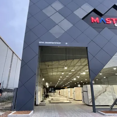 The completed facade for the Master Granitto marble store in Jigani. We worked with angular geometry, ACP panels, and glass to create a dynamic and modern form that reflects the nature of the business.
