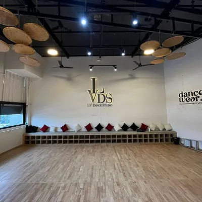 Welcome to our creative space. Our studio is designed for comfort and performance, featuring suspended wooden floors, professional sound systems, and a great atmosphere to learn and rehearse for your big day.