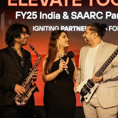 Sharing a laugh on stage with my bandmates at the PaloAlto FY25 India & SAARC Partner Summit. A professional performance doesn't mean we can't have fun.