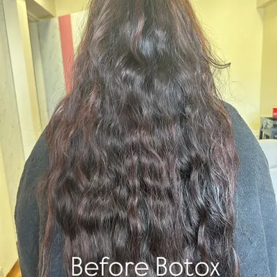 This is the 'before' state of hair that is perfect for my Hair Botox treatment. You can see the effects of damage, with significant frizz, dryness, and a lack of shine and manageability. This is the starting point from which we achieve a total hair transformation.