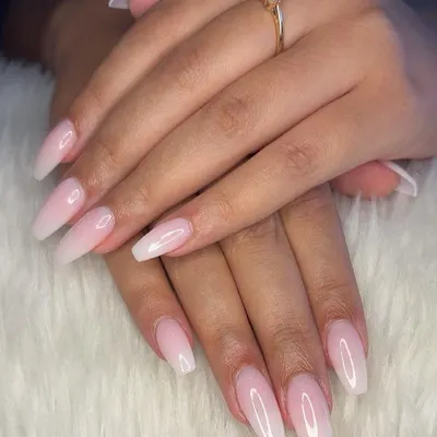 An absolute classic, the milky white ombré or "baby boomer" nail. This set on long coffin-shaped extensions is timeless, elegant, and goes with everything.