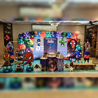 An epic superhero assembly for Satyam's 7th birthday! This massive setup brings together Spiderman, Hulk, Captain America, Superman, and Iron Man with a shimmering backdrop and an action-packed balloon garland.