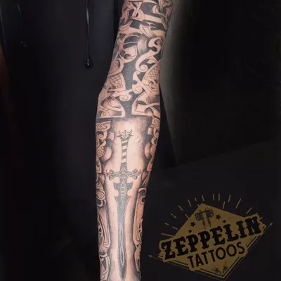 A work-in-progress shot of a custom Nordic-inspired sleeve tattoo. I teach students how to plan and execute large-scale projects with intricate patterns and bold negative space.