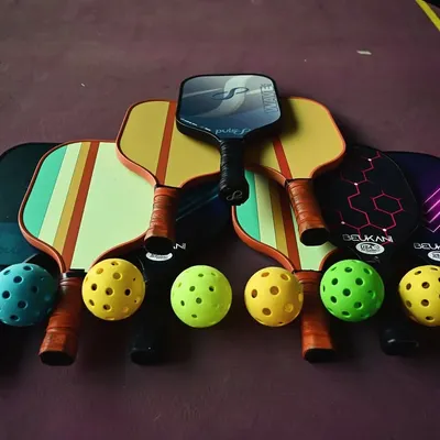 We have all the gear you need to get started with pickleball. A colorful array of paddles and balls are ready for your next game.