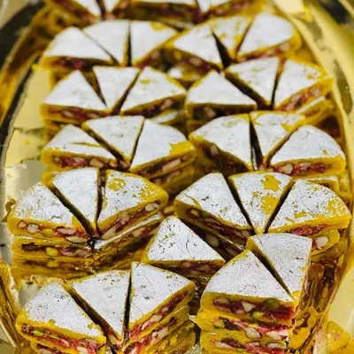 A sweet welcome for your guests. This Dryfruit Sandwich is a rich, layered mithai that looks as incredible as it tastes, perfect for starting any celebration on a sweet note.