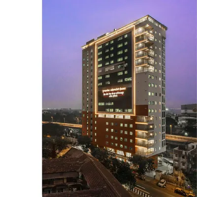 The 20-story Punyashlok Ahilyadevi Holkar Head & Neck Cancer Institute stands as a beacon of hope in a dense urban environment. The facade is designed to be a landmark of specialized care, merging advanced medical facilities with a patient-centric approach.