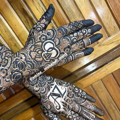 A beautiful design for an engagement, featuring the couple's initials and a ring motif.
