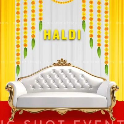 A digital design concept for a Haldi ceremony. This preview shows a classic theme with a white and gold-trimmed sofa, a backdrop of yellow drapes, and traditional marigold flower hangings.