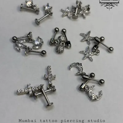 We've restocked our collection of aesthetic studs. These pieces are made from high-quality surgical steel and are perfect for cartilage and lobe piercings.