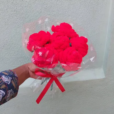 A vibrant bouquet of six red crochet roses, wrapped and ready to be gifted. These are perfect for anniversaries, Valentine's Day, or just to say "I love you."