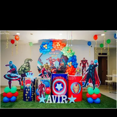 Avengers assembled for Avir's third birthday with this action-packed superhero setup. The decor features life-sized cutouts of heroes like Captain America, Hulk, and Thor, along with themed plinths and a vibrant balloon arrangement.