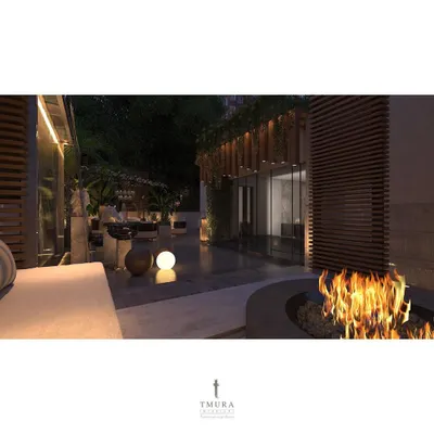We designed this terrace as an outdoor living room, complete with a central fire pit for warmth and ambiance. Our custom-made, weather-resistant outdoor furniture ensures comfort without sacrificing style.