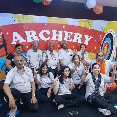 A happy group of senior citizens from NMT elder care after their archery session. This shows that archery is an accessible and enjoyable sport for everyone.