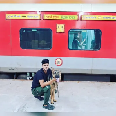 Posing with a German Shepherd on the platform at New Delhi station before starting our journey from Dibrugarh.