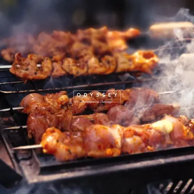 The irresistible aroma of a live barbecue station. Our chefs grill skewers to perfection right before your eyes, adding a sizzling and interactive element to your New Year's party or any outdoor gathering.