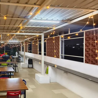 This is the rooftop cafeteria of Bizom, a software company on Sarjapur Road, which we decorated for Christmas. We used strings of warm fairy lights to create a cozy and festive ambiance for their employees to enjoy during the holiday season.