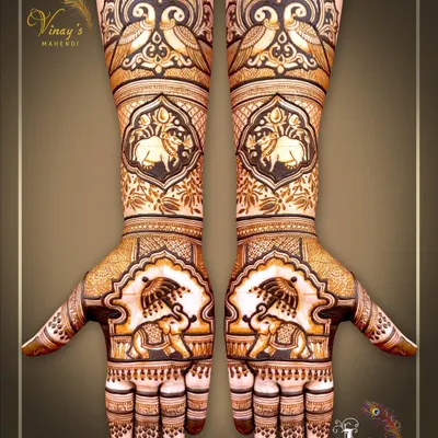 A stunning symmetrical design featuring royal elephants with umbrellas on the palms and forearms. The intricate details and traditional motifs give it a truly regal feel.