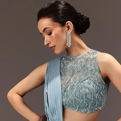 A beautiful soft glam look for a Kalki Fashion campaign. The clean, low bun and defined eyes create an elegant style perfect for a bridesmaid or a cocktail party.